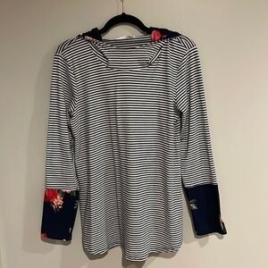 Navy and white striped top with a floral bottom sleeve Size M